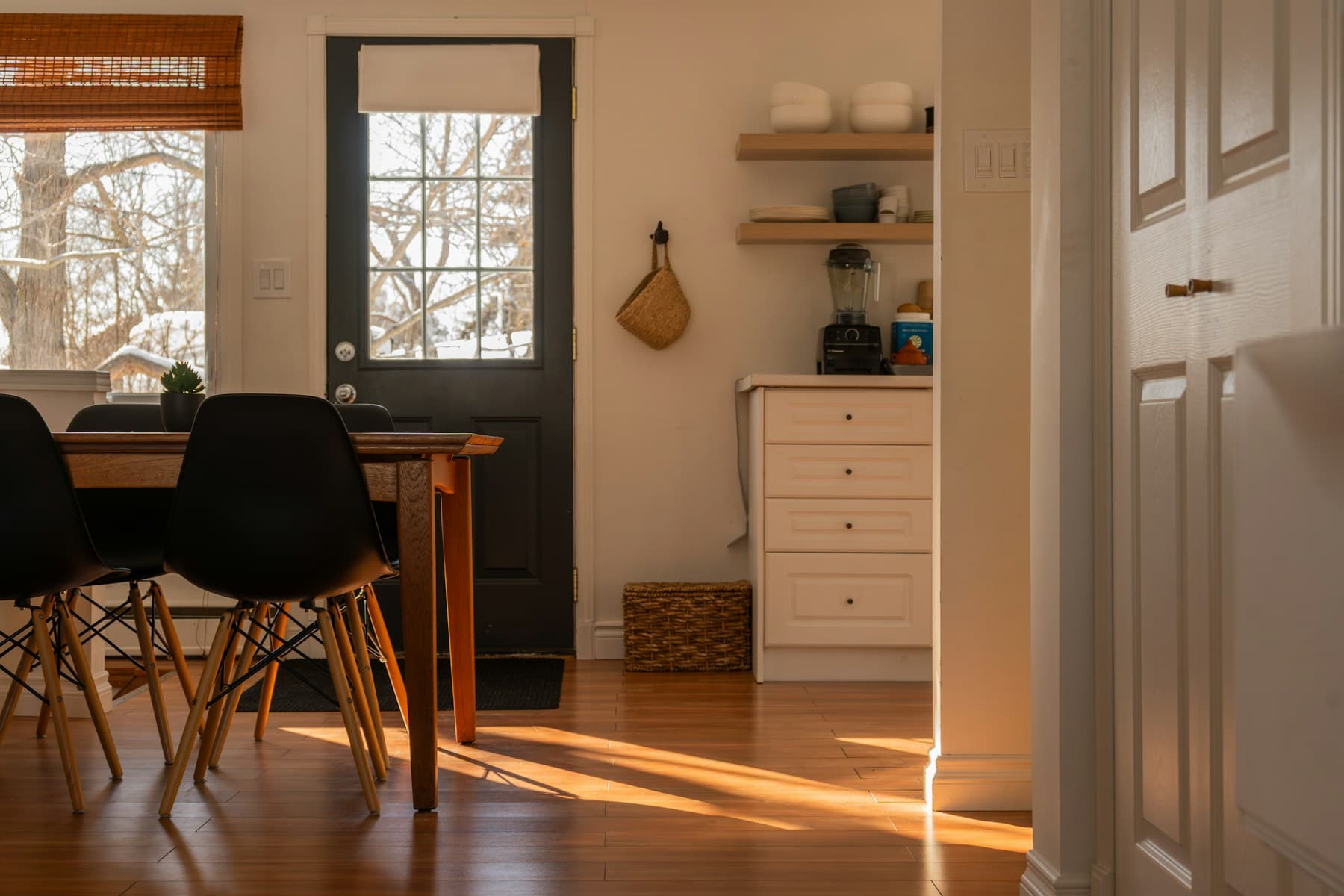 Sunlit dining area beside the kitchen