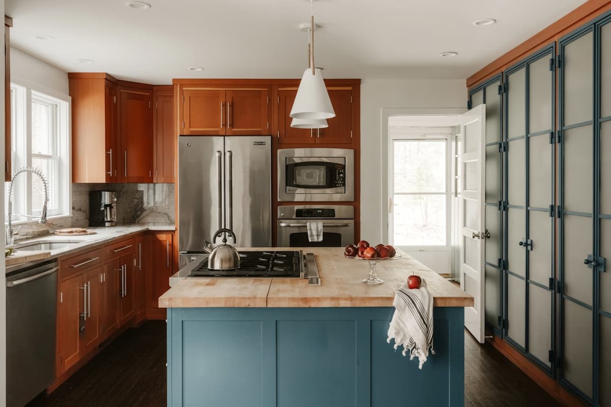 Kitchen with an island and surrounding cabinetry